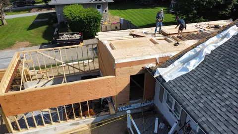 The addition from above during framing, crew on the upper level