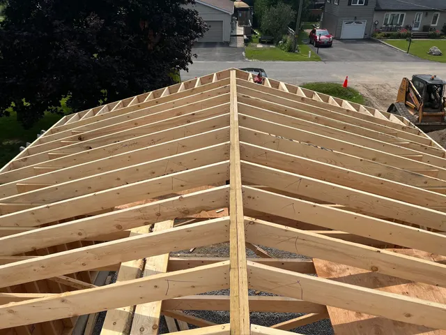 Roof rafters framed over a new addition, seen from above